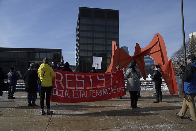 Far-left protesters gather on Calder Plaza on Saturday, January 20, 2018.