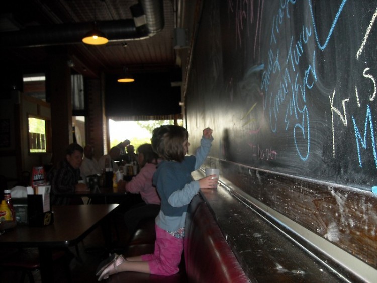 Ritz Koney customers are welcome to draw on a full wall-length chalk board. 