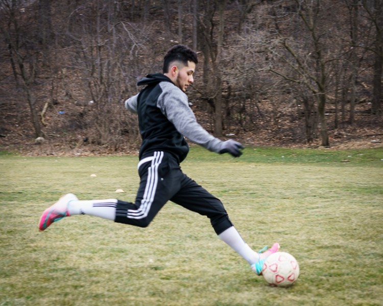 Ernesto Pulido practices soccer at Clemente Park