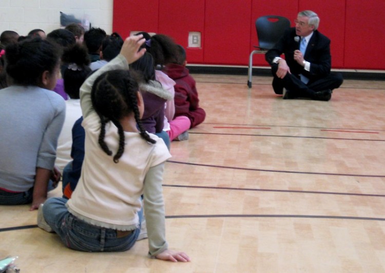 Mayor George Heartwell talks with young students about the importance of reading