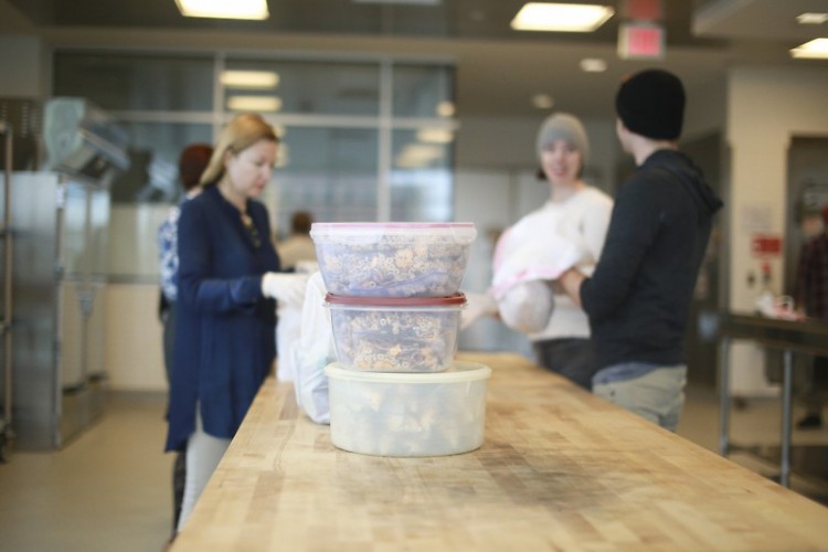 Business owners building community in the Incubator Kitchen.