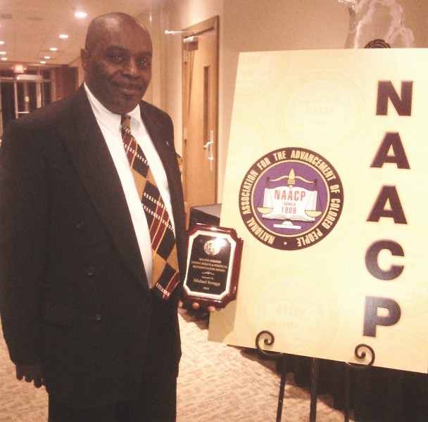 Scruggs receiving the 2014 NAACP Walter Berman Voting Rights & Political Representation award.