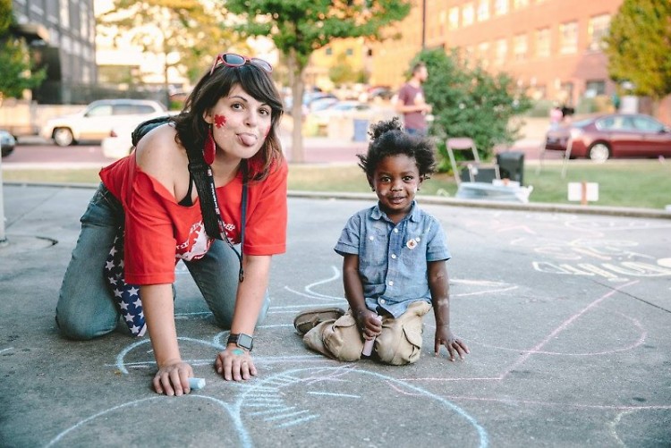 Heartside Downtown Neighborhood Association Co-Chair Alysha Lach-White got chalky with kiddos at 2018's event.