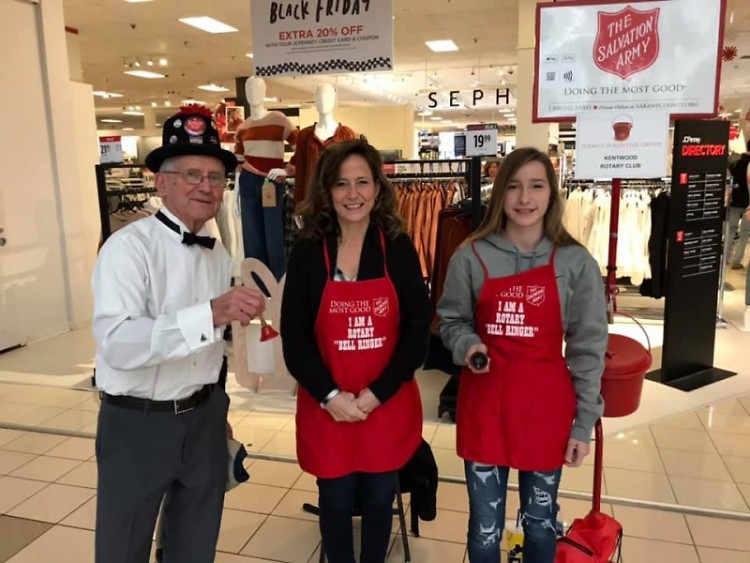 Kentwood Rotarians ring bells in front of JCPenney