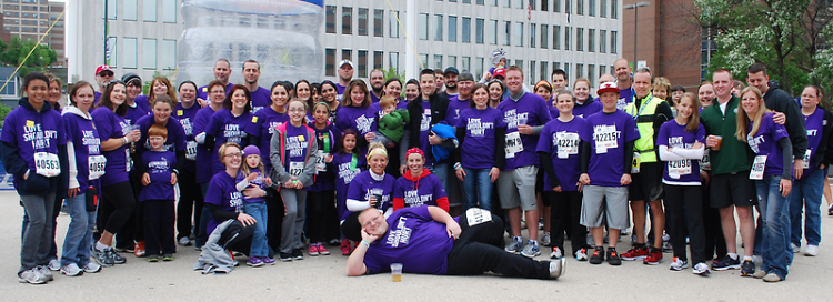 The 2013 Running for Jenny team pose for a photograph following the Fifth Third River Bank Run. 