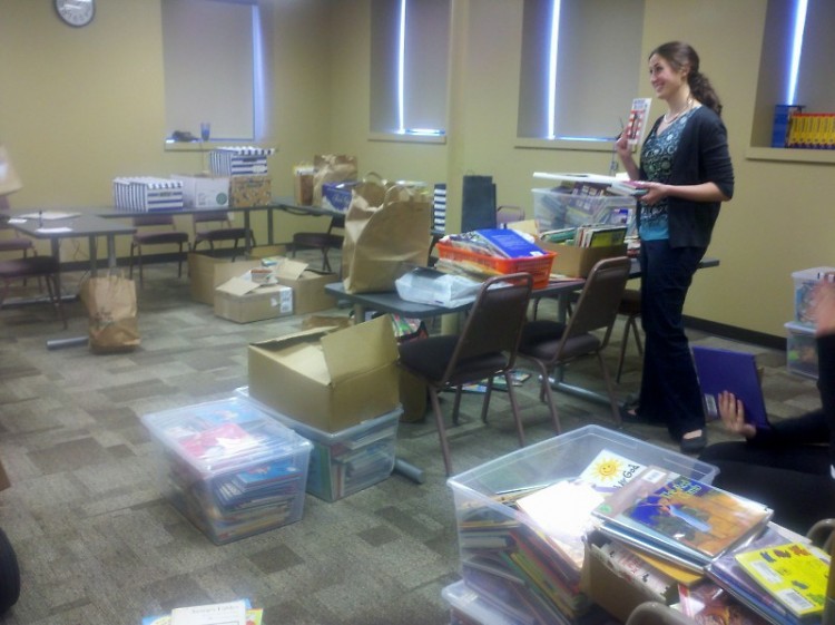 Literacy Center staff count and sort books