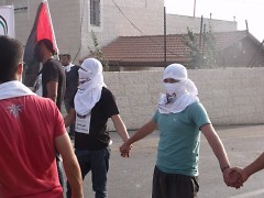A group of Palestinian demonstrators lined up before an International Peace Day demonstration.