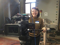 Mariah Cowsert, AmeriCorps VISTA at Dwelling Place, getting behind the camera during the workshop
