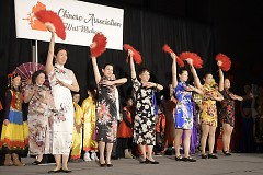 A fashion show featuring Asian customs style of dress closes out the celebration