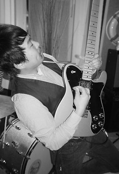 Dan Fisher playing guitar