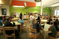 Parents and neighbors in the B2B West Zone discuss ways to support their kids for success.