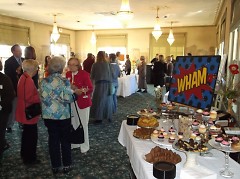 Attendees socializing with each other for Wham event. 