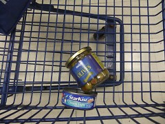 Left behind: When cashing out, I had to leave my beloved olives and a can of tuna behind. Suddenly, these were luxury items.