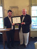 Garret Ellison (L) was presented with the 2015 Baxter Award by Grand Rapids Historical Society Trustee Tom Dilley.