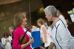Grand Rapids Symphony's Music for Health program is administered by Diane McElfish Helle (left) s