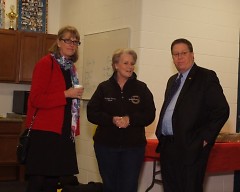 Ruth Kelly, Lynn Rabaut and Greg Sundstrom visit inside new community room