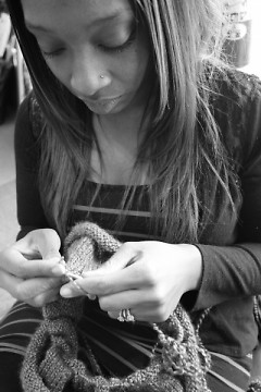 Temia knitting a Ninja Neck in the studio 