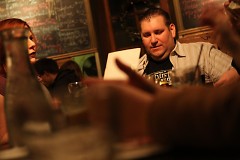 Adam Reinke picks what to order at Harmony Brewing.