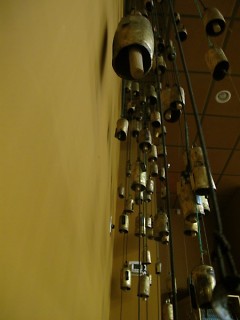 Bells cascade from the ceiling of the Dirk Koning Microcinema.