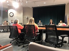 Mari Jo Thompson and Leslie Desmarais making public comments at the school board meeting