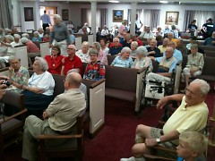 Clark residents pack the retirement center's chapel for lipdub premiere