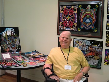 Patient artist with his work