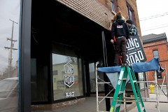 Signs and last touches are going up at Long Road Distillers as they prepare to open