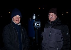 Javier Estrada (left) and Frank Roldan show off a high-powered telescope
