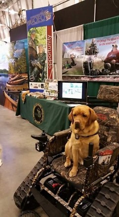 When Program Coordinator Tom Jones is out promoting MiOFO among outdoorsmen, his service dog Baxter always comes along.