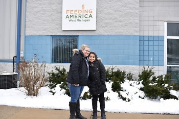 Olivia and her mother visited the Feeding America West Michigan warehouse to see firsthand how the food bank operates. 