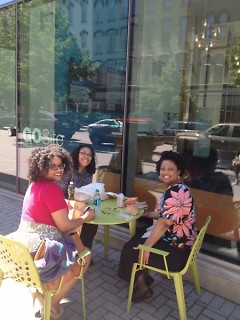 Downtown workers enjoying the GoSite outdoor seating on a sunny day
