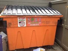 A Spurt Industries dumpster.
