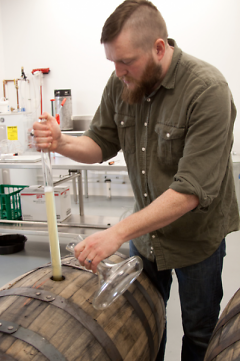 Jason Lummen testing cider for gravity content