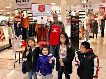 Children enjoy ringing bells with the Kentwood Rotary Club