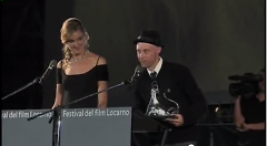 Potrykus accepting the award for Best New Director at this year's Locarno International Film Festival. 
