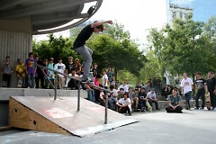 The crowd watches a skateboarder during the June fundraising competition.