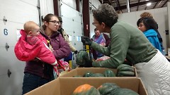 An estimated 200 households received food at Feeding America West Michigan's pre-Thanksgiving distribution.
