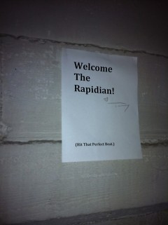 Tommy Allen provided a heartfelt welcome to the Rapidian art beat with a sign in the stairwell