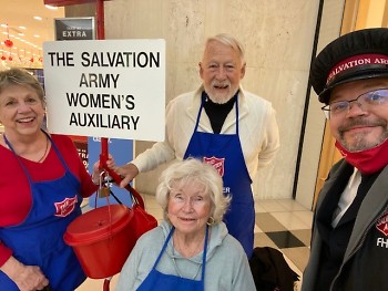 Members of TSA Women's Auxiliary help ring bells at Macy's on Saturday. 
